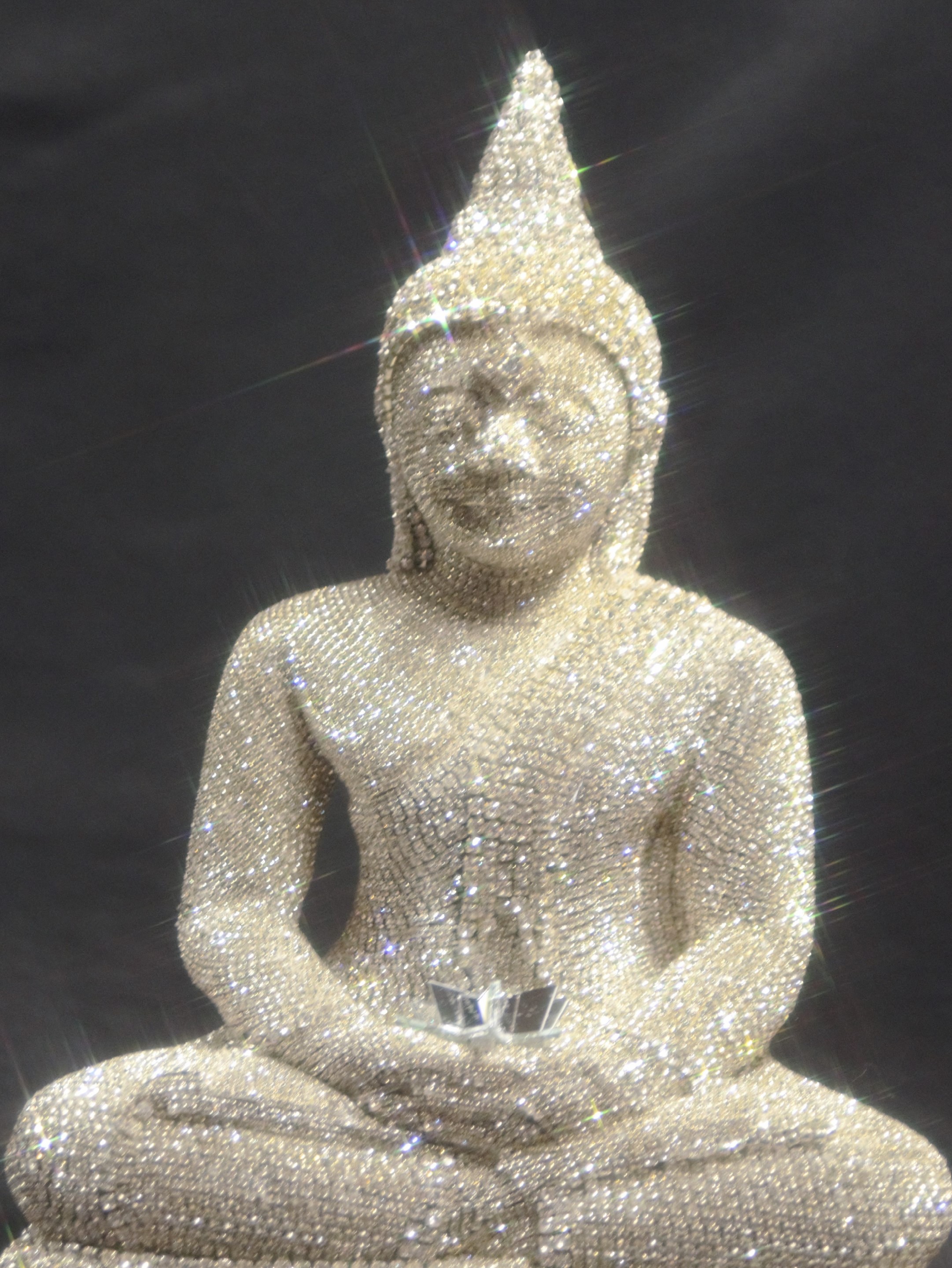 Serene Majesty: Crystal Buddha in Silver – Collector's Delight